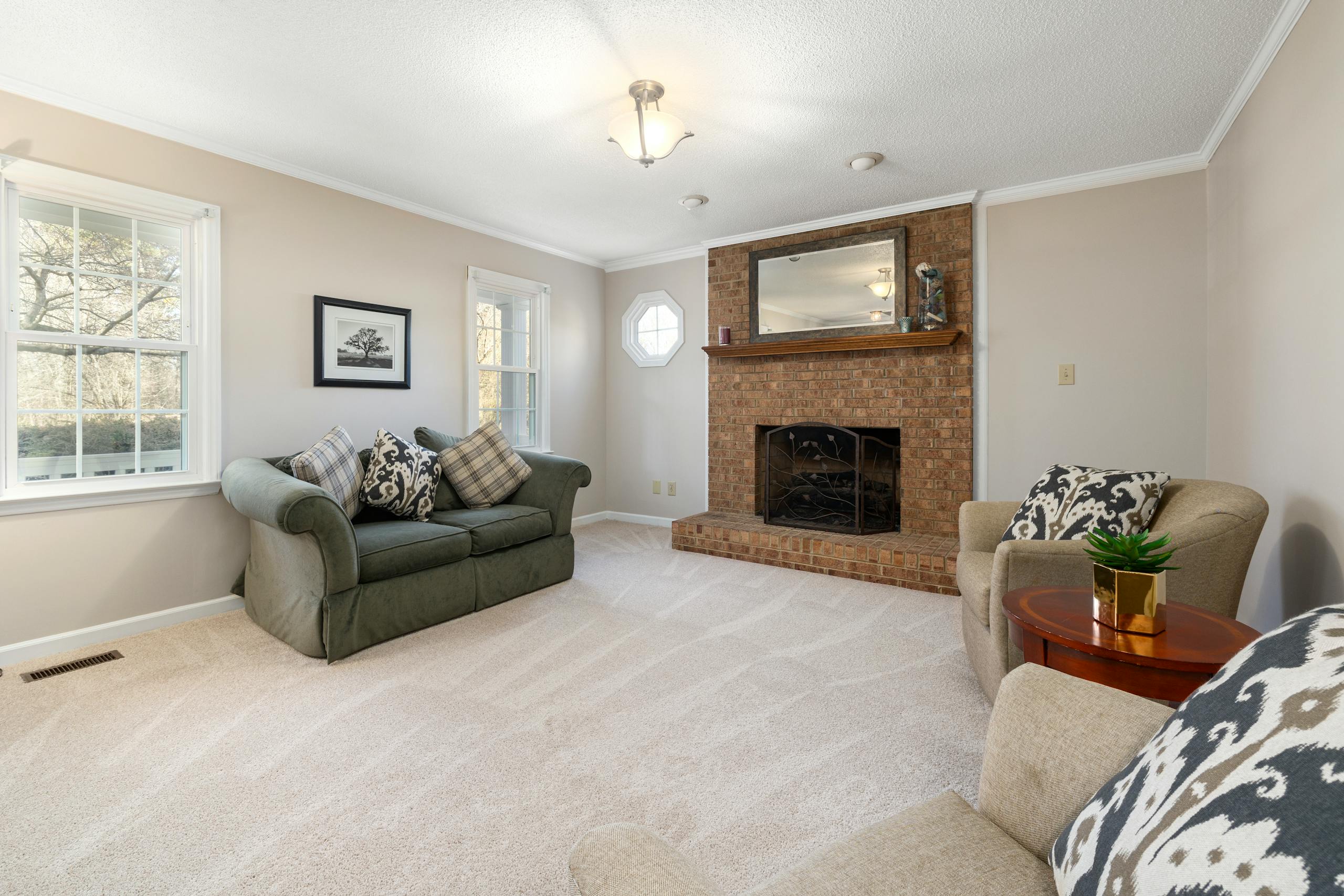 carpet burn damage from fireplace needing carpet repair in Red Deer